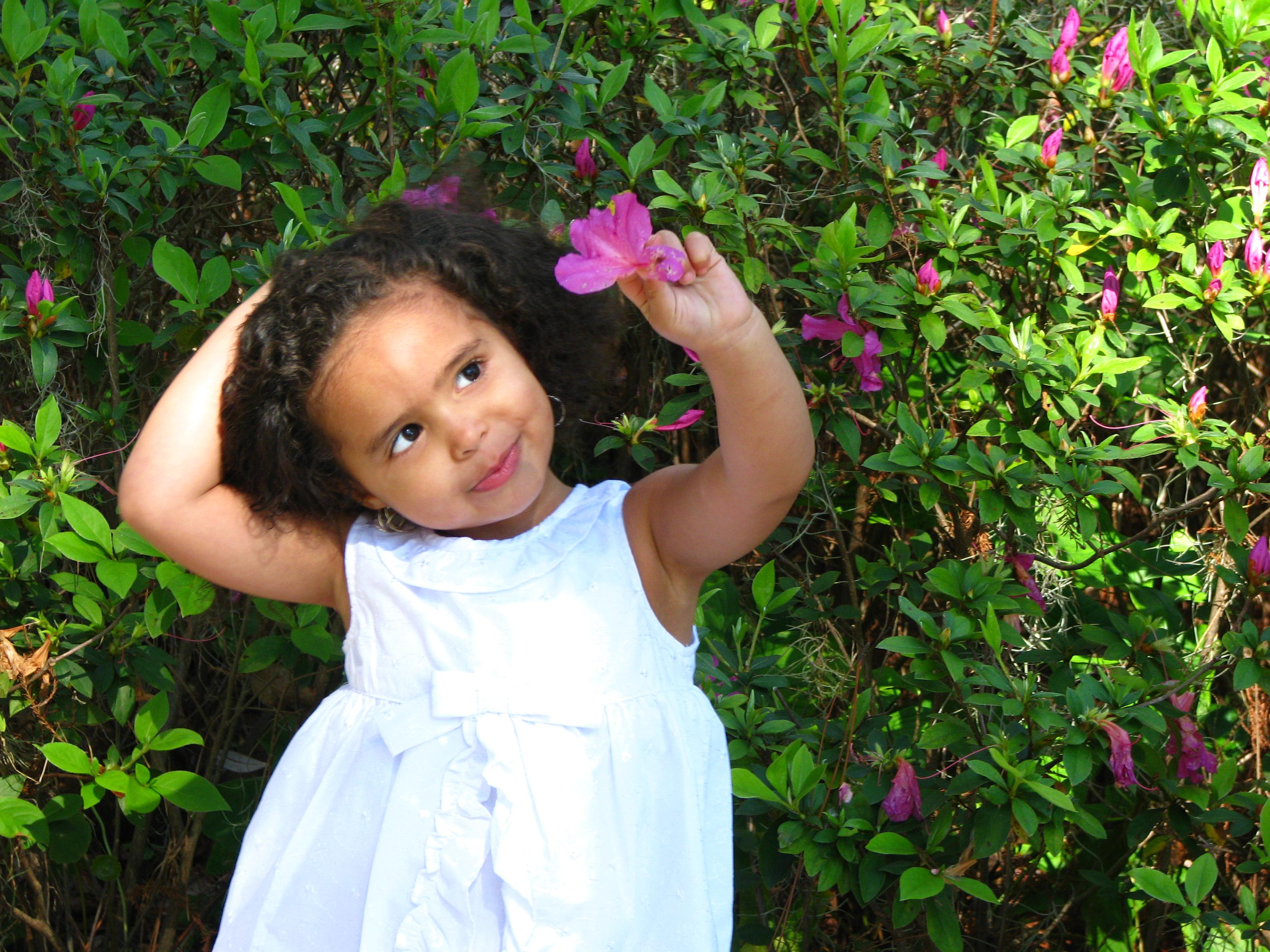 little girl with flower